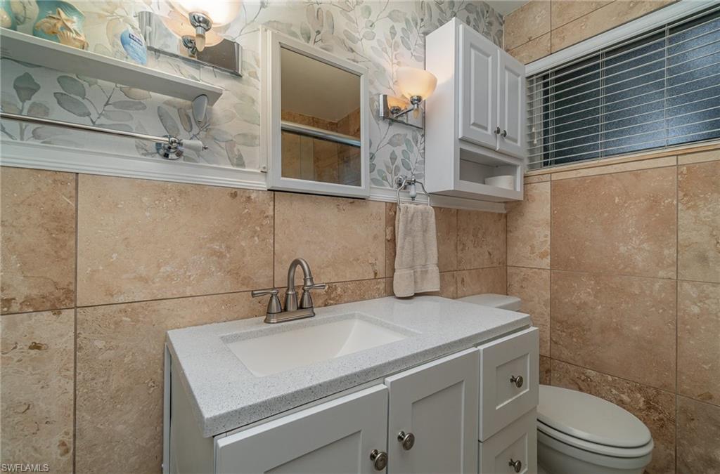 4826 Gary Road Bonita Springs, FL 34134 - Photo 19 of 24 Guest Bath has a big tiled shower/tub!