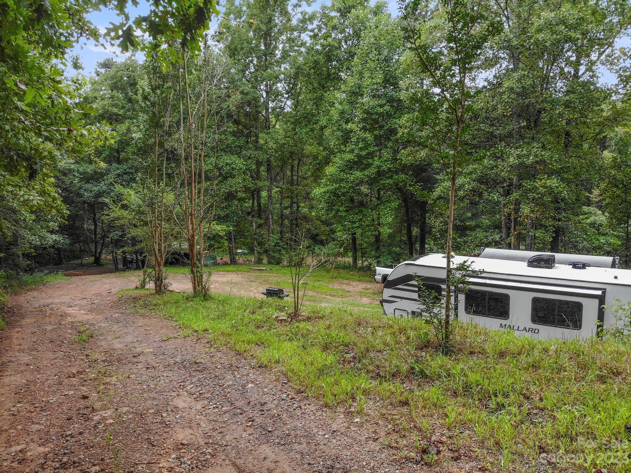 601 St Paul Church Road Casar, NC 28020 - Photo 15 of 33 a view of a house with a yard and sitting area