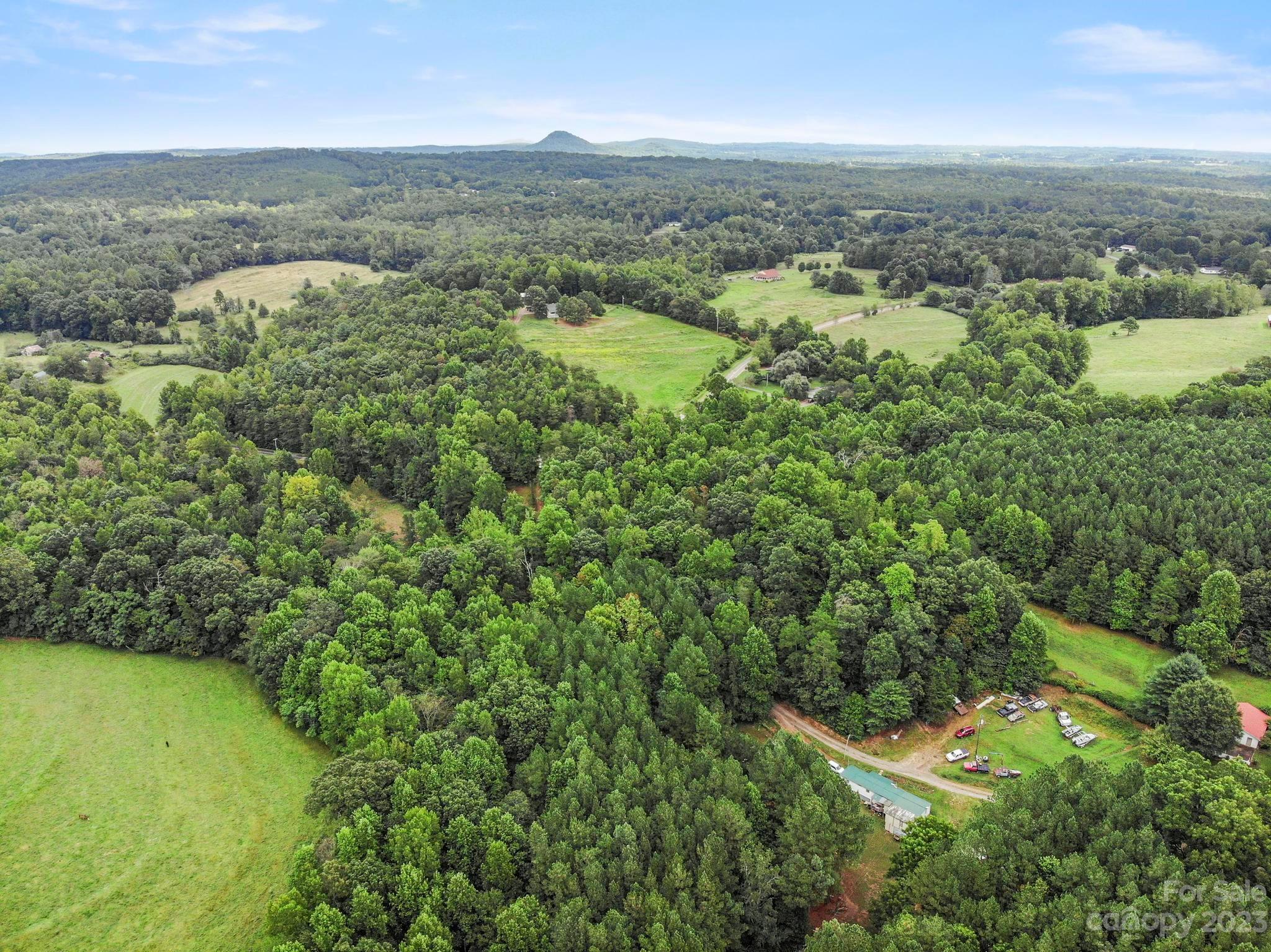 601 St Paul Church Road Casar, NC 28020 - Photo 18 of 33 an aerial view of residential houses with outdoor space and trees