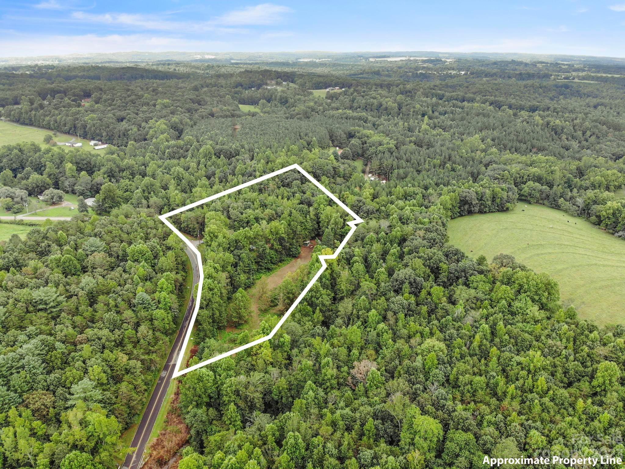 601 St Paul Church Road Casar, NC 28020 - Photo 2 of 33 a view of a yard from a balcony