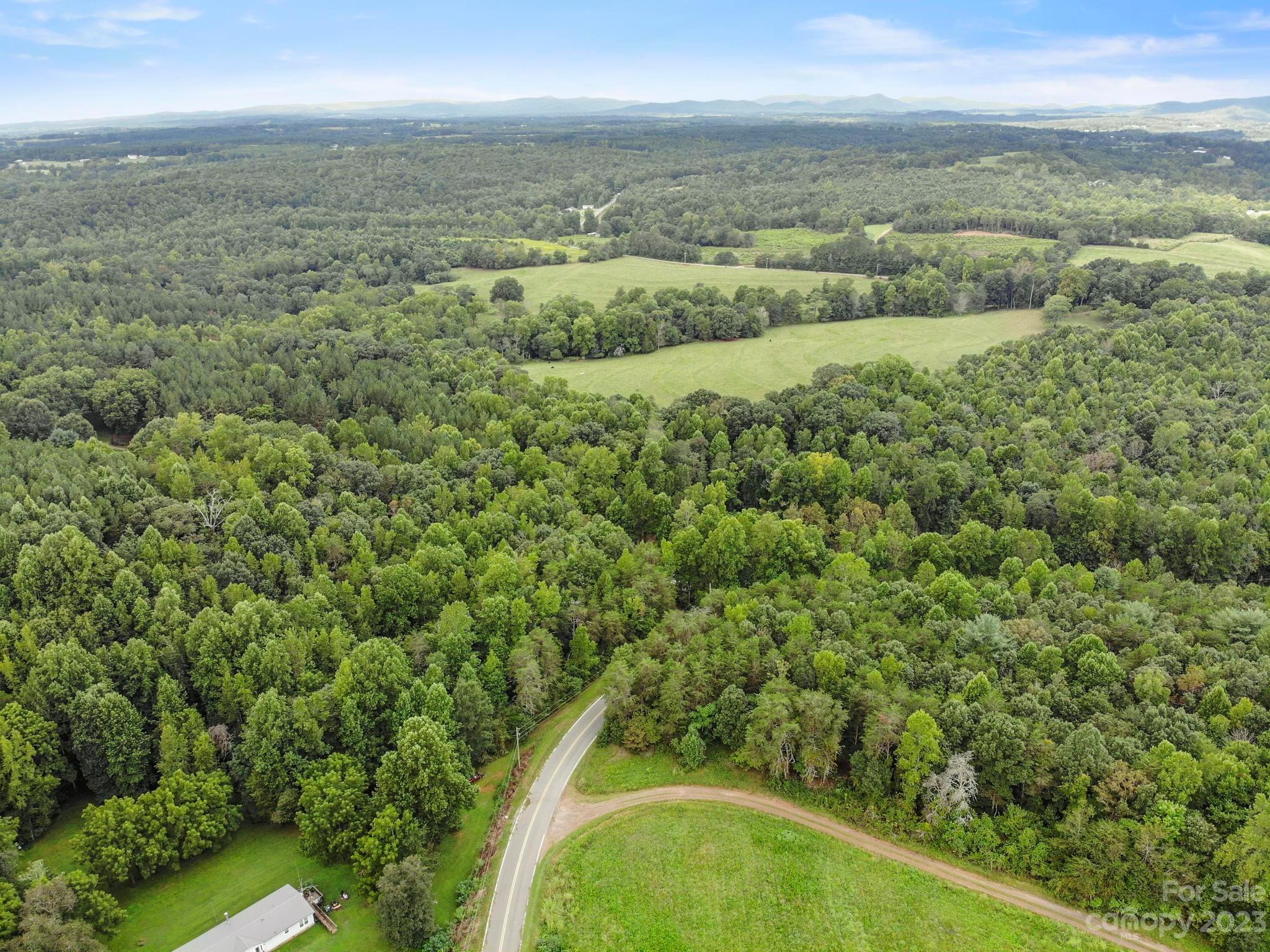 601 St Paul Church Road Casar, NC 28020 - Photo 23 of 33 a view of a city with lush green forest