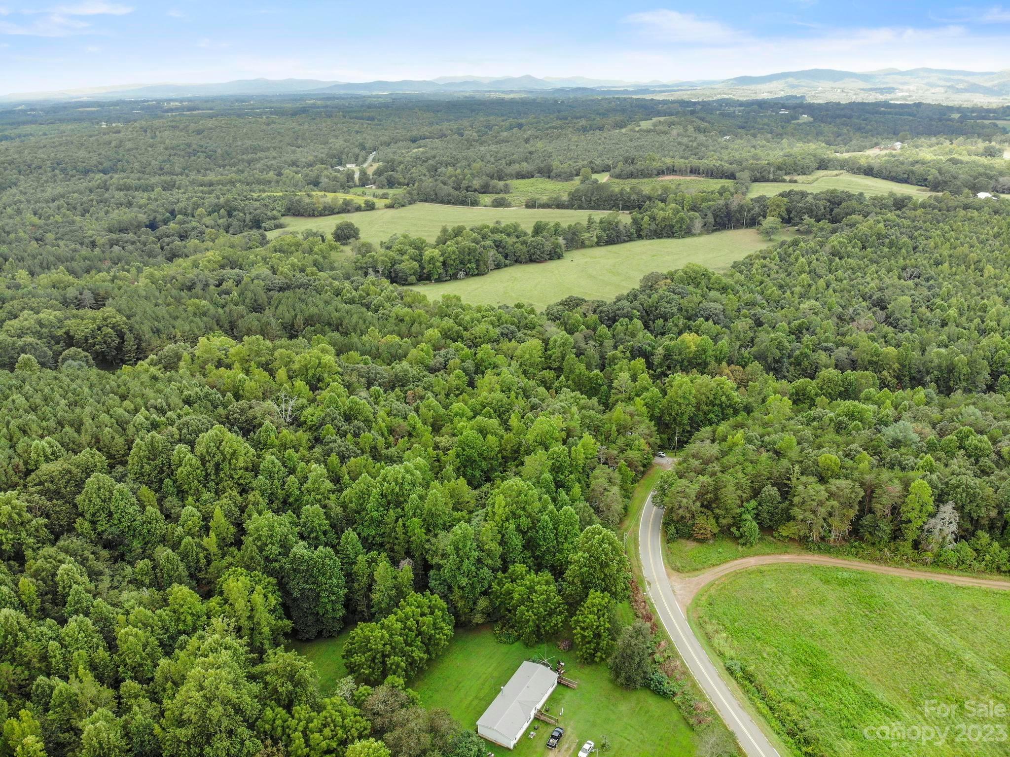 601 St Paul Church Road Casar, NC 28020 - Photo 24 of 33 a view of a city with lush green forest