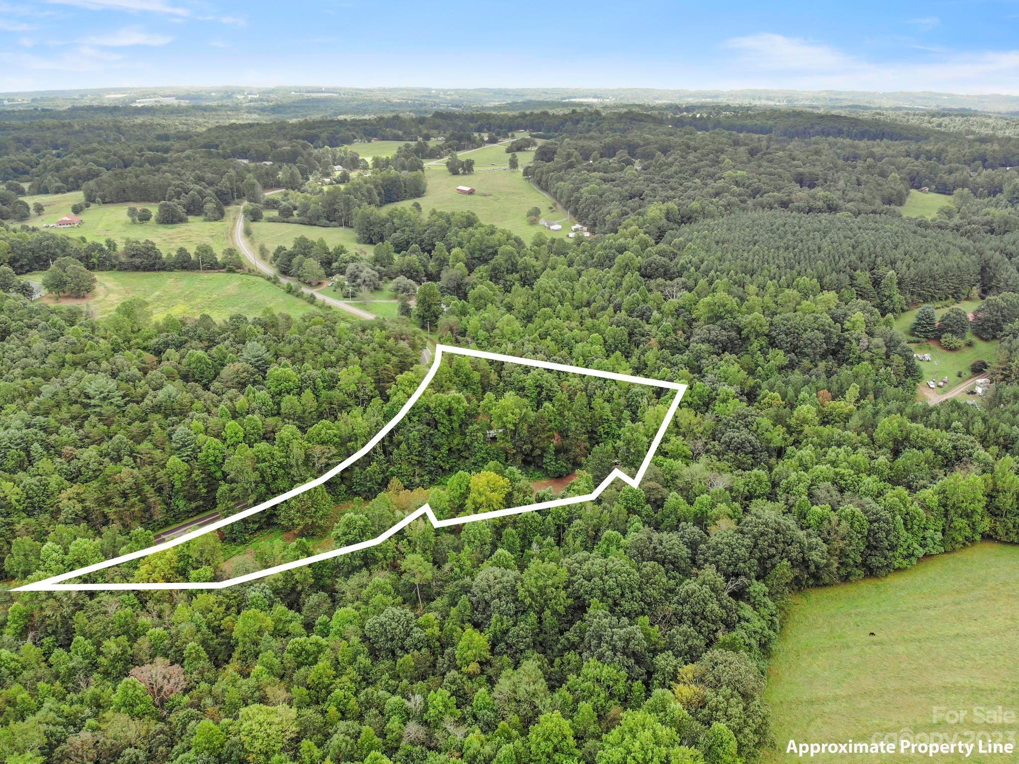 601 St Paul Church Road Casar, NC 28020 - Photo 30 of 33 a view of a field with an ocean