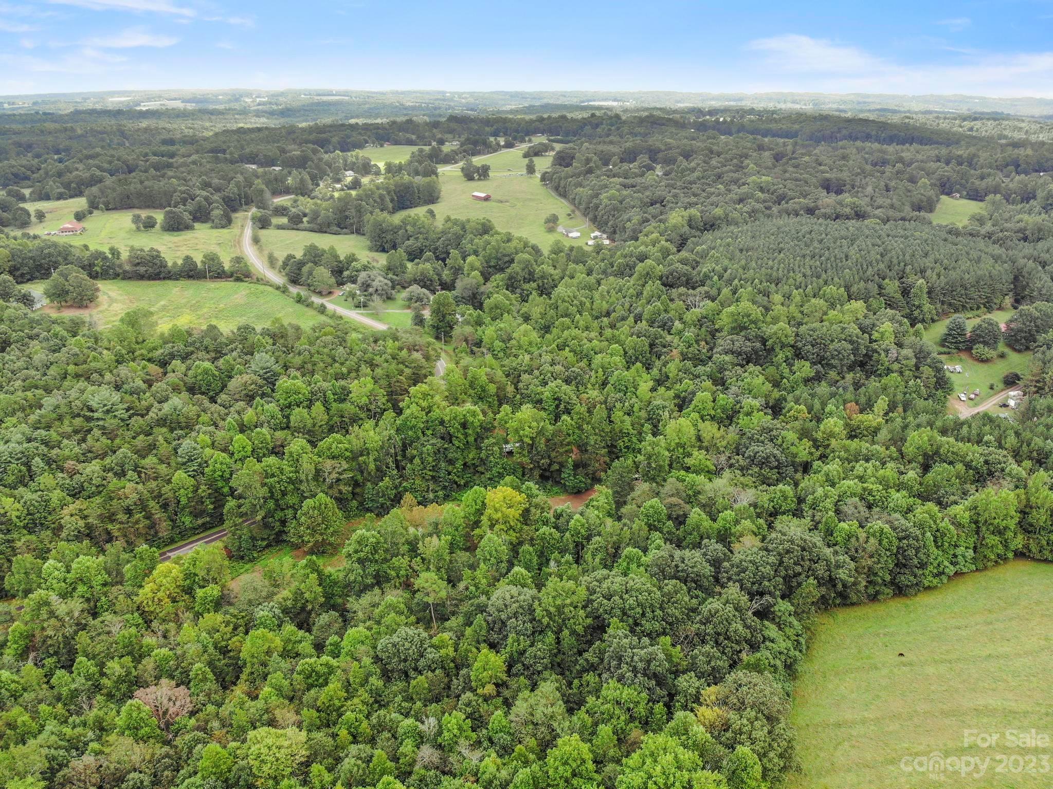 601 St Paul Church Road Casar, NC 28020 - Photo 31 of 33 an aerial view of residential houses with outdoor space and trees