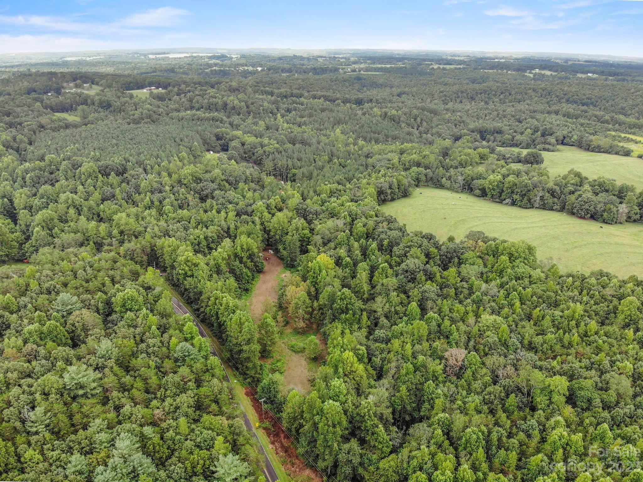 601 St Paul Church Road Casar, NC 28020 - Photo 33 of 33 a view of a city with lush green forest