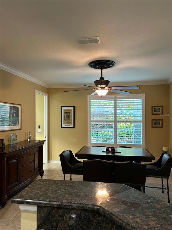 8979 Southwest 86th Loop Ocala, FL 34481 - Photo 6 of 28 a living room with furniture and a large window