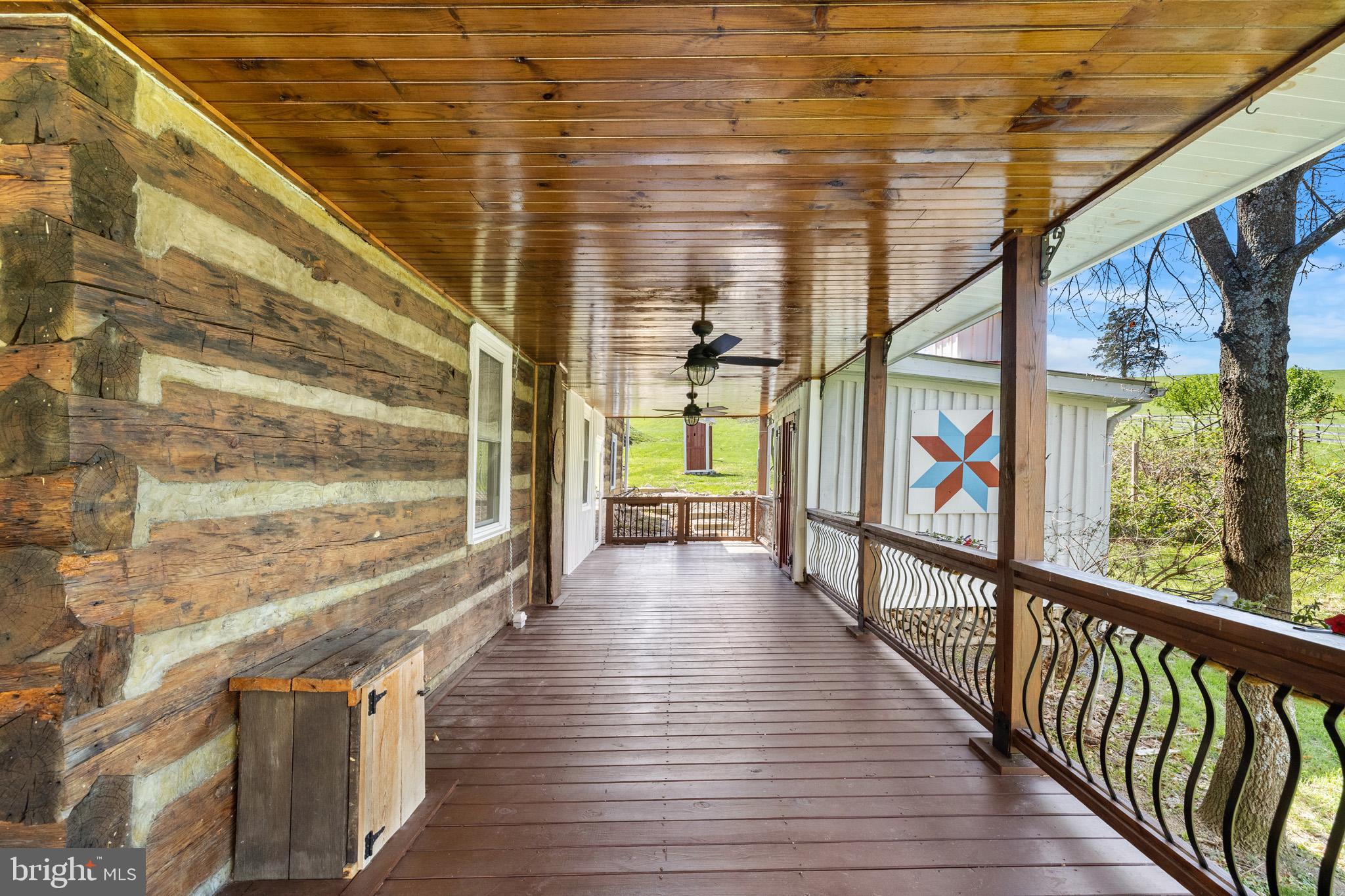 989 Swover Creek Road Edinburg, VA 22824 - Photo 80 of 132 a view of a balcony with wooden floor