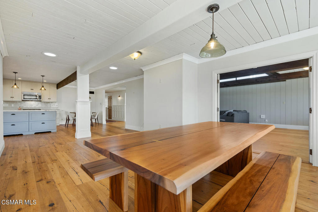 11316 Barranca Road Camarillo, CA 93012 - Photo 13 of 44 a room with kitchen island a sink stainless steel appliances and cabinets