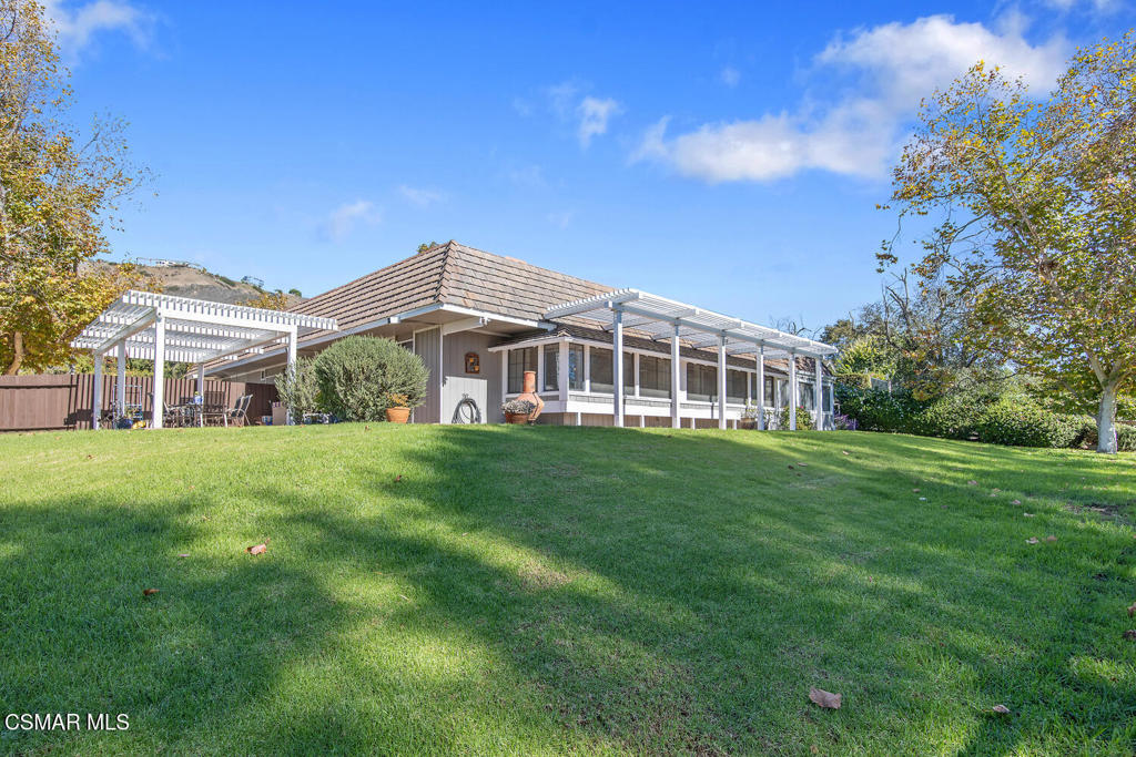 11316 Barranca Road Camarillo, CA 93012 - Photo 3 of 44 a front view of a house with a garden