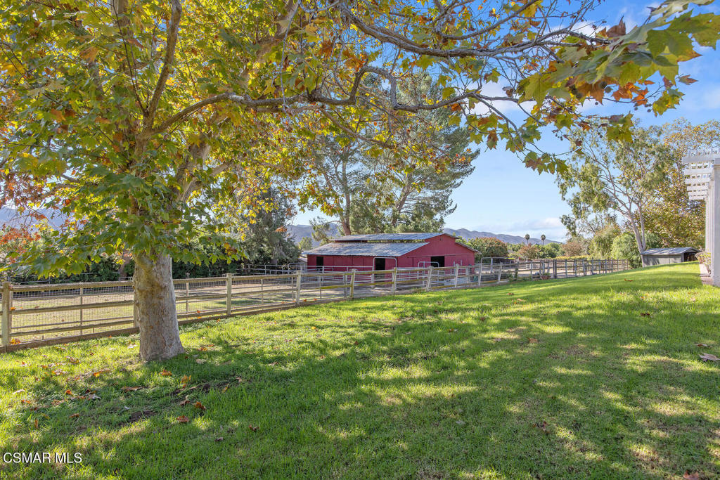 11316 Barranca Road Camarillo, CA 93012 - Photo 41 of 44 a backyard of a house with table and chairs