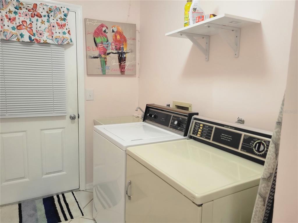 10967 Southwest 65th Avenue Ocala, FL 34476 - Photo 4 of 16 a utility room with dryer and washer