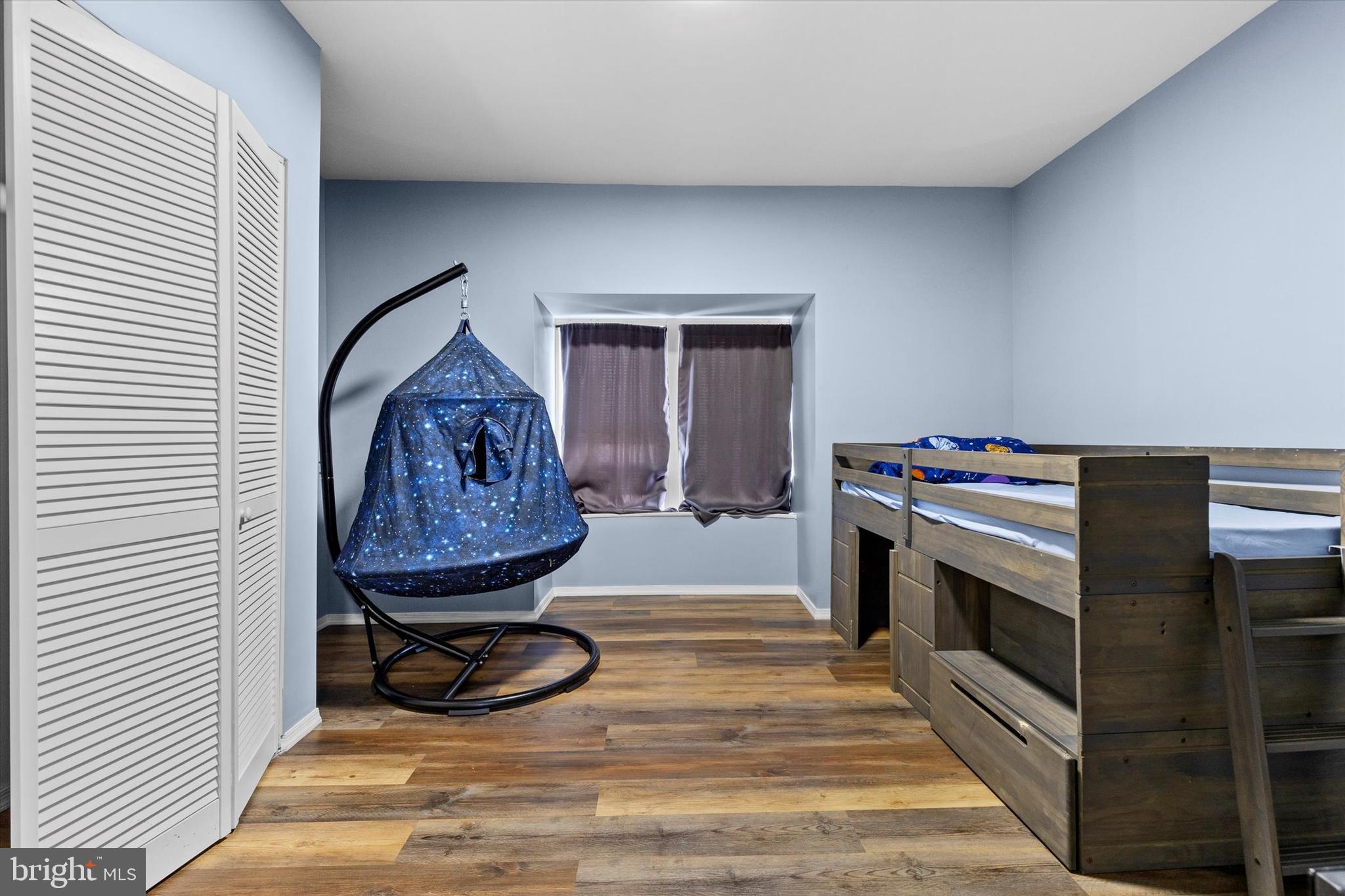 826 South Beaver Street York, PA 17403 - Photo 16 of 26 a room with wooden floor and a fireplace