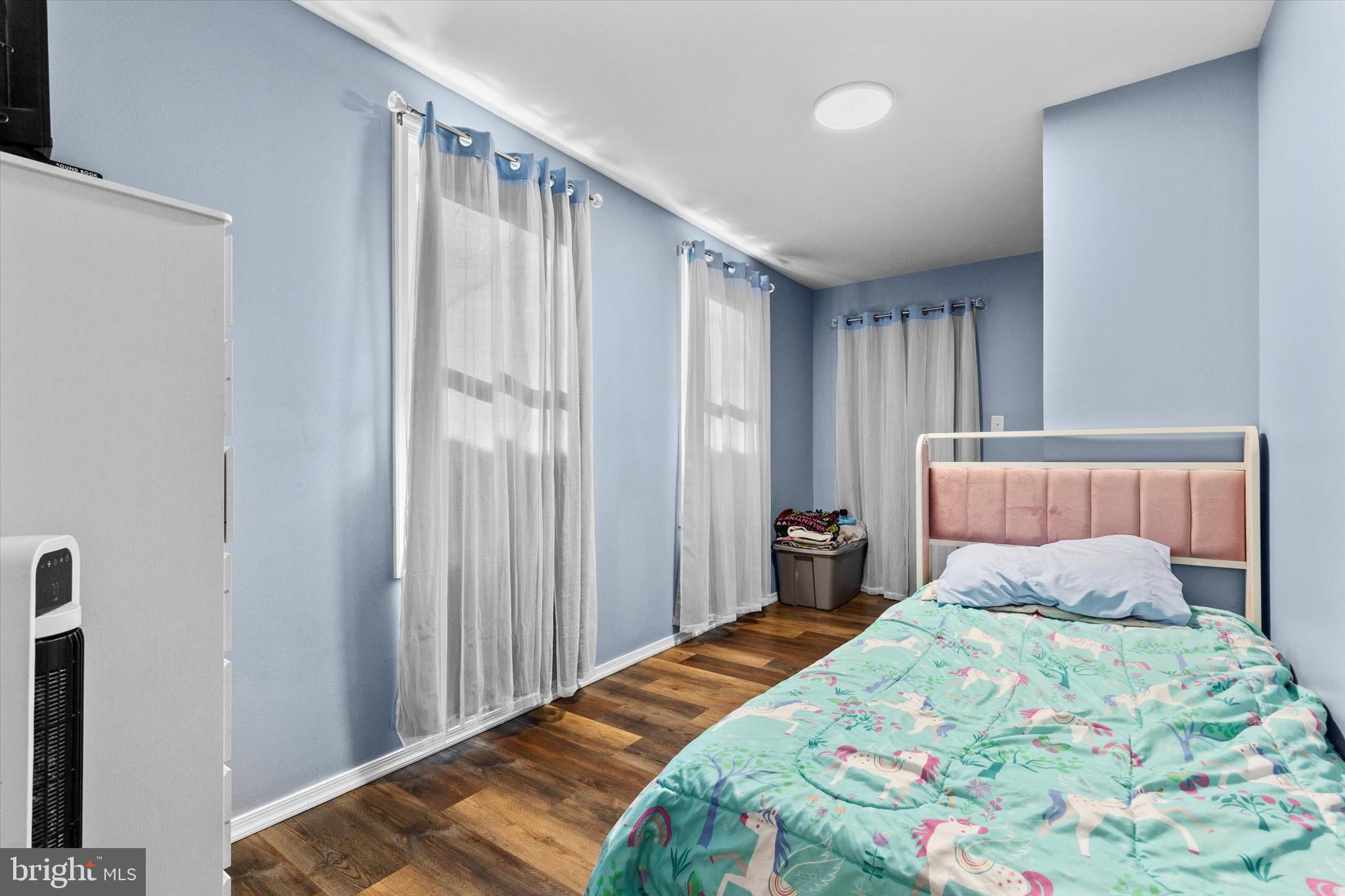 826 South Beaver Street York, PA 17403 - Photo 9 of 26 a bedroom with a bed and a window