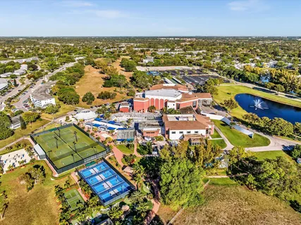 an aerial view of a house with a garden
