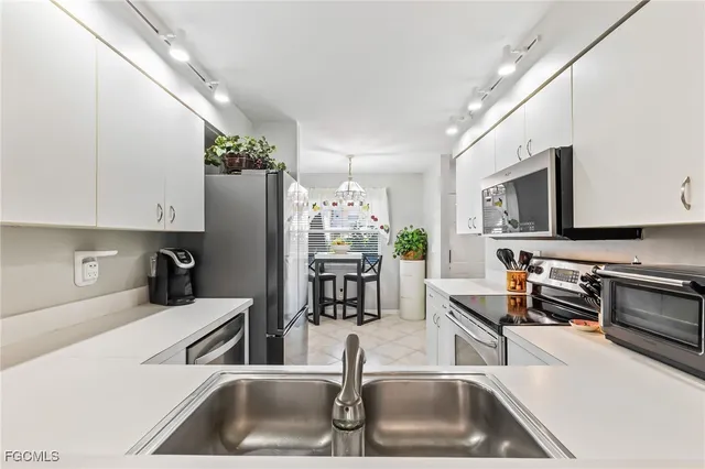 $290,000 | 120 Pebble Shores Drive, Unit 101, Naples, FL 34110