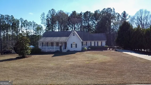 a house with trees in the background