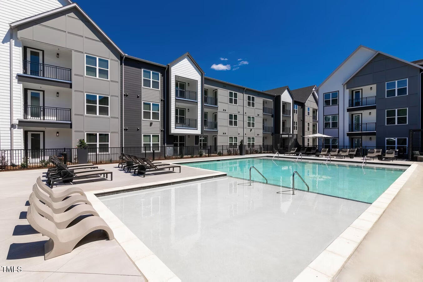 821 Hanbury Way, Unit A1 1 Raleigh, NC 27607 - Photo 31 of 43 a view of a patio with swimming pool table and chairs