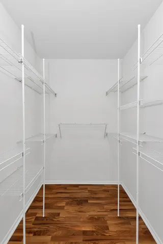 a view of an empty walk in closet
