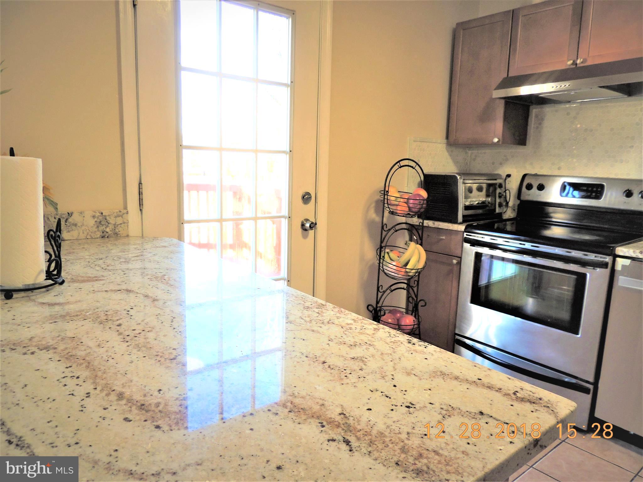 6810 Ben Franklin Road Springfield, VA 22150 - Photo 14 of 31 Nice and spacious beautiful granite counter top.
