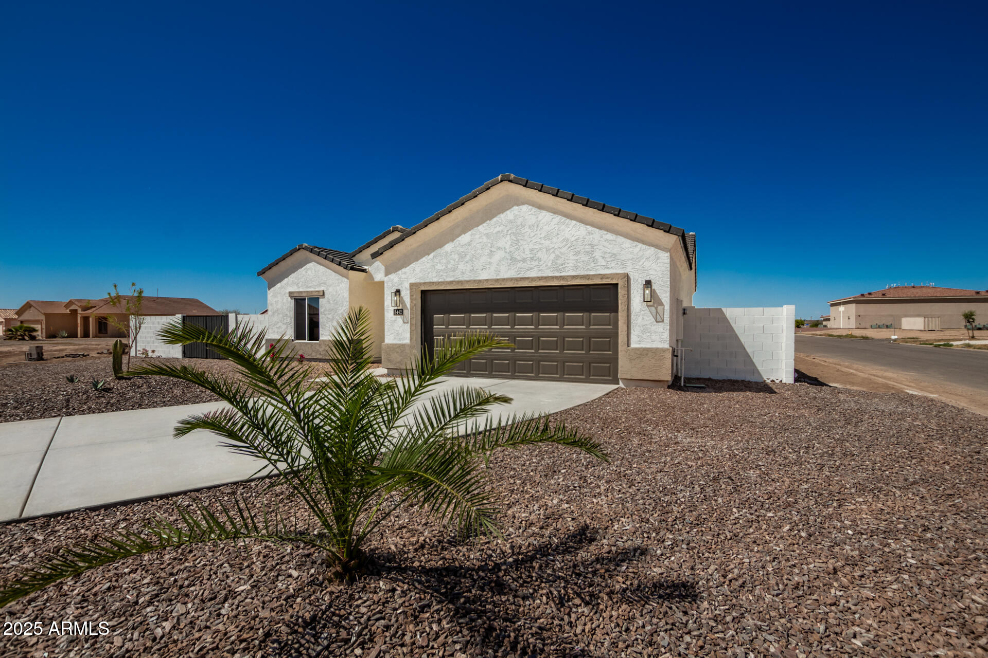 15220 South Diablo Road Arizona City, AZ 85123 - Photo 1 of 32 a front view of a house with a yard