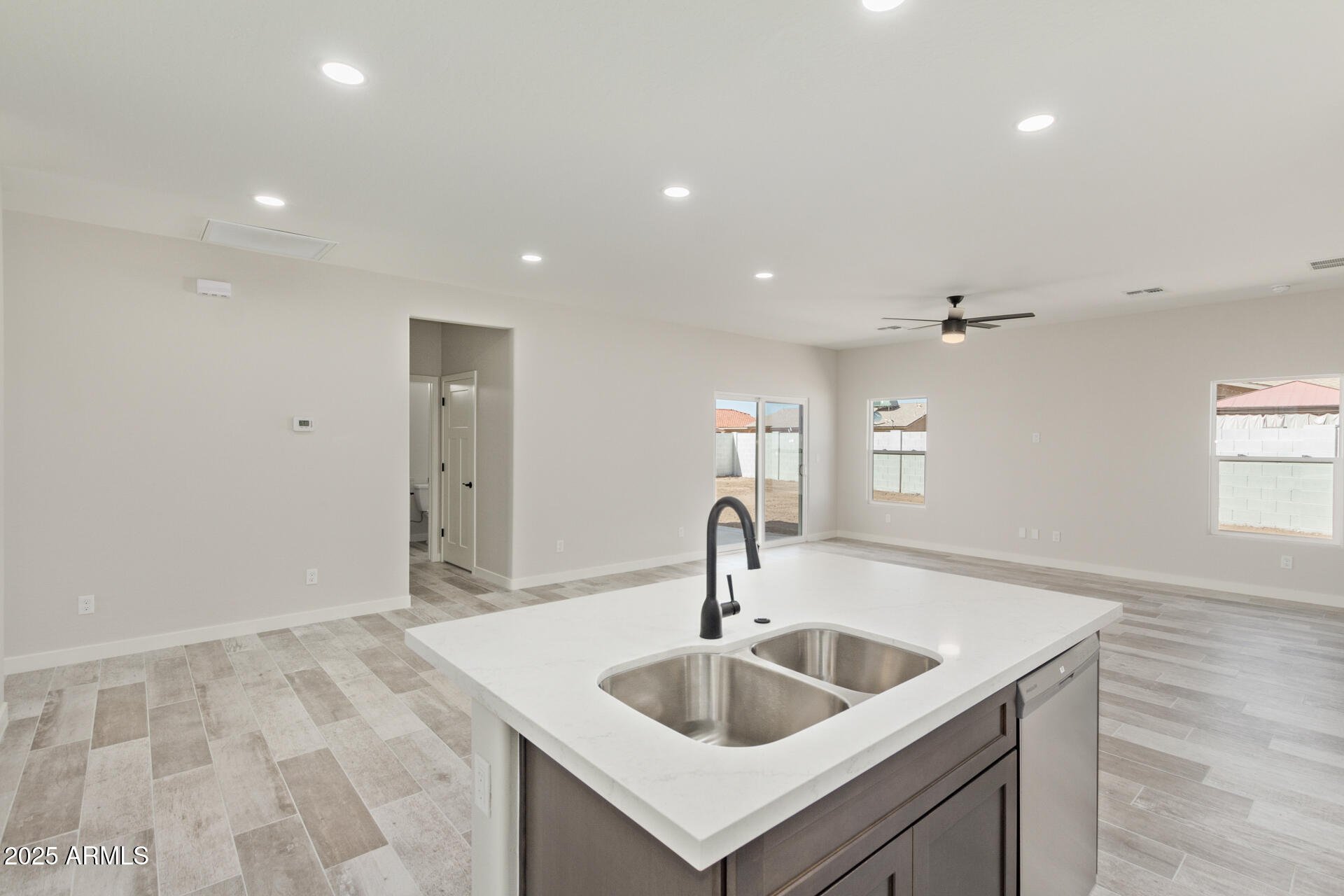 15220 South Diablo Road Arizona City, AZ 85123 - Photo 12 of 32 a kitchen with a sink and chandelier