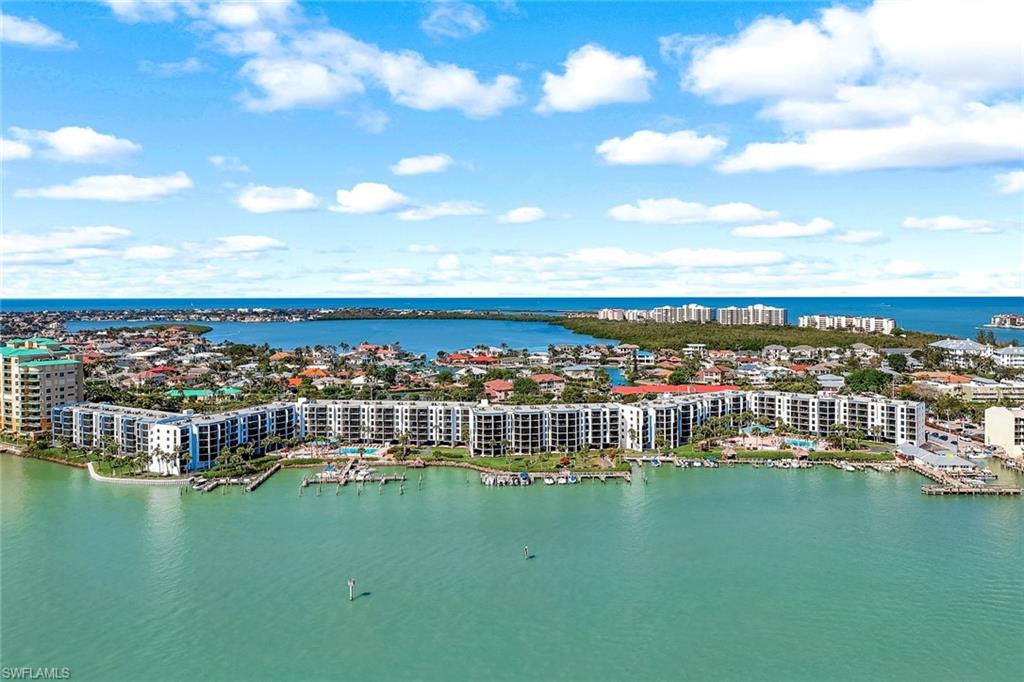 Bird's eye view featuring a city view and a water view