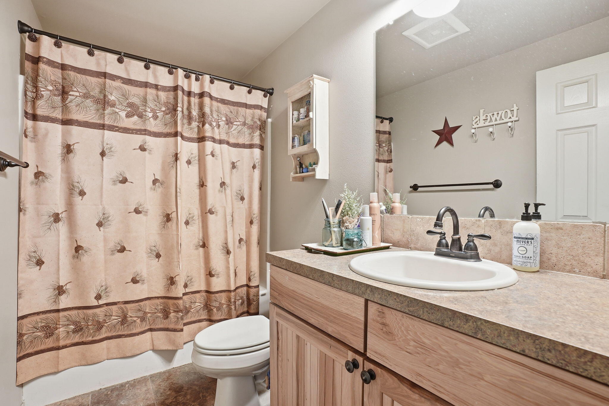 51432 Jory Road La Pine, OR 97739 - Photo 21 of 51 a bathroom with a granite countertop sink a toilet and a mirror