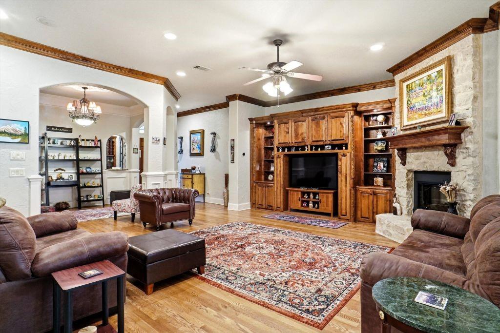 620 Highview Lane Hurst, TX 76054 - Photo 13 of 40 a living room with furniture and a fireplace