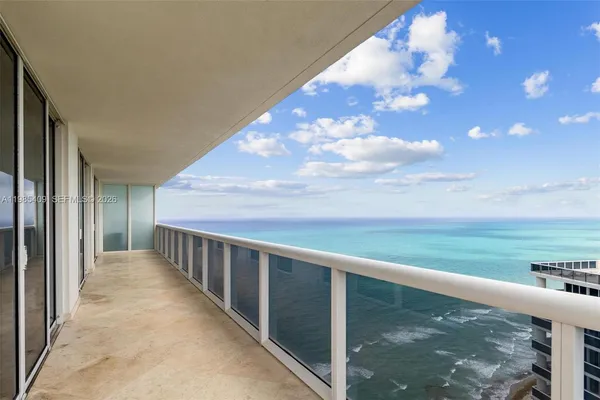 a view of balcony with ocean view