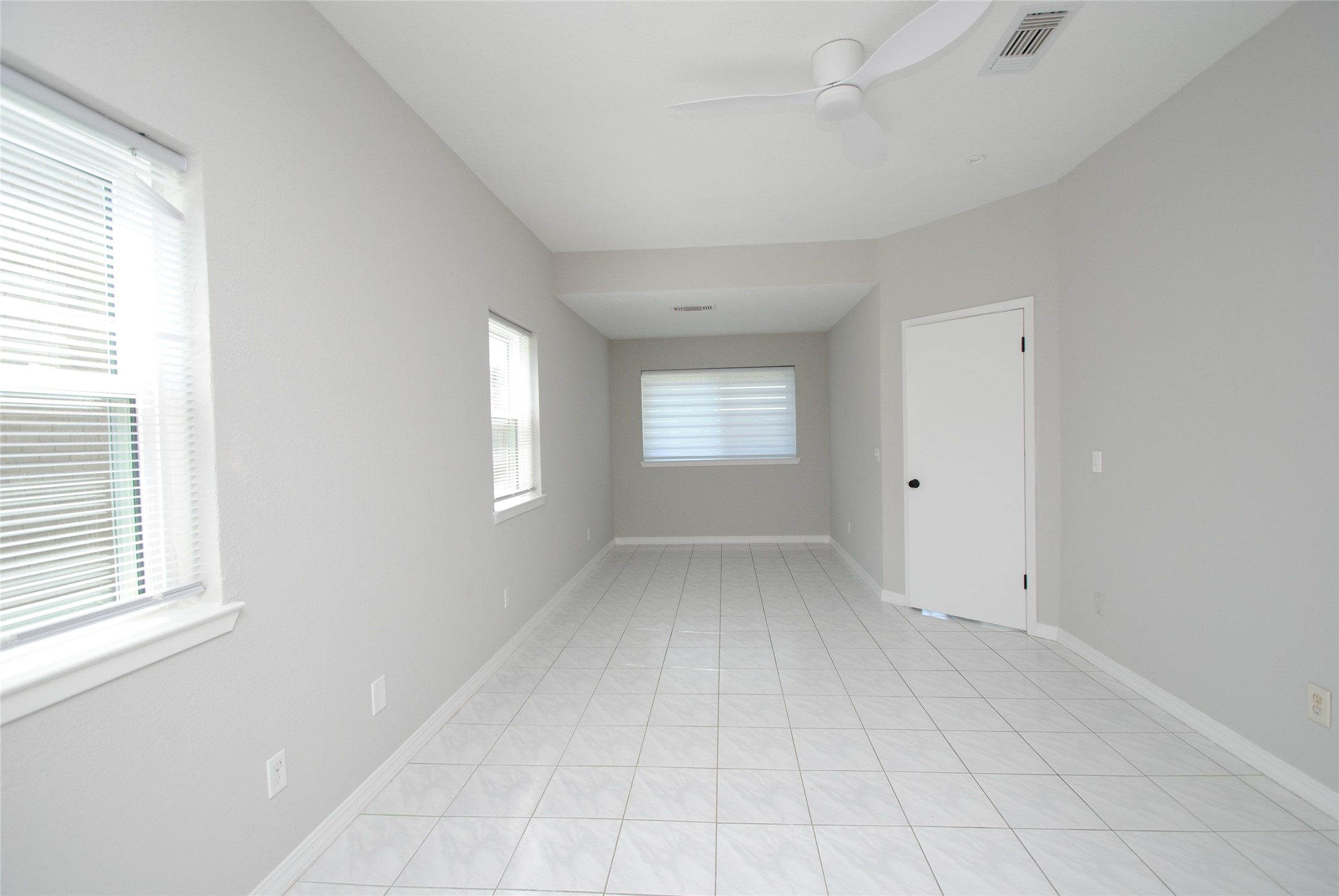 22831 John Rolfe Lane Katy, TX 77449 - Photo 20 of 34 an empty room with windows