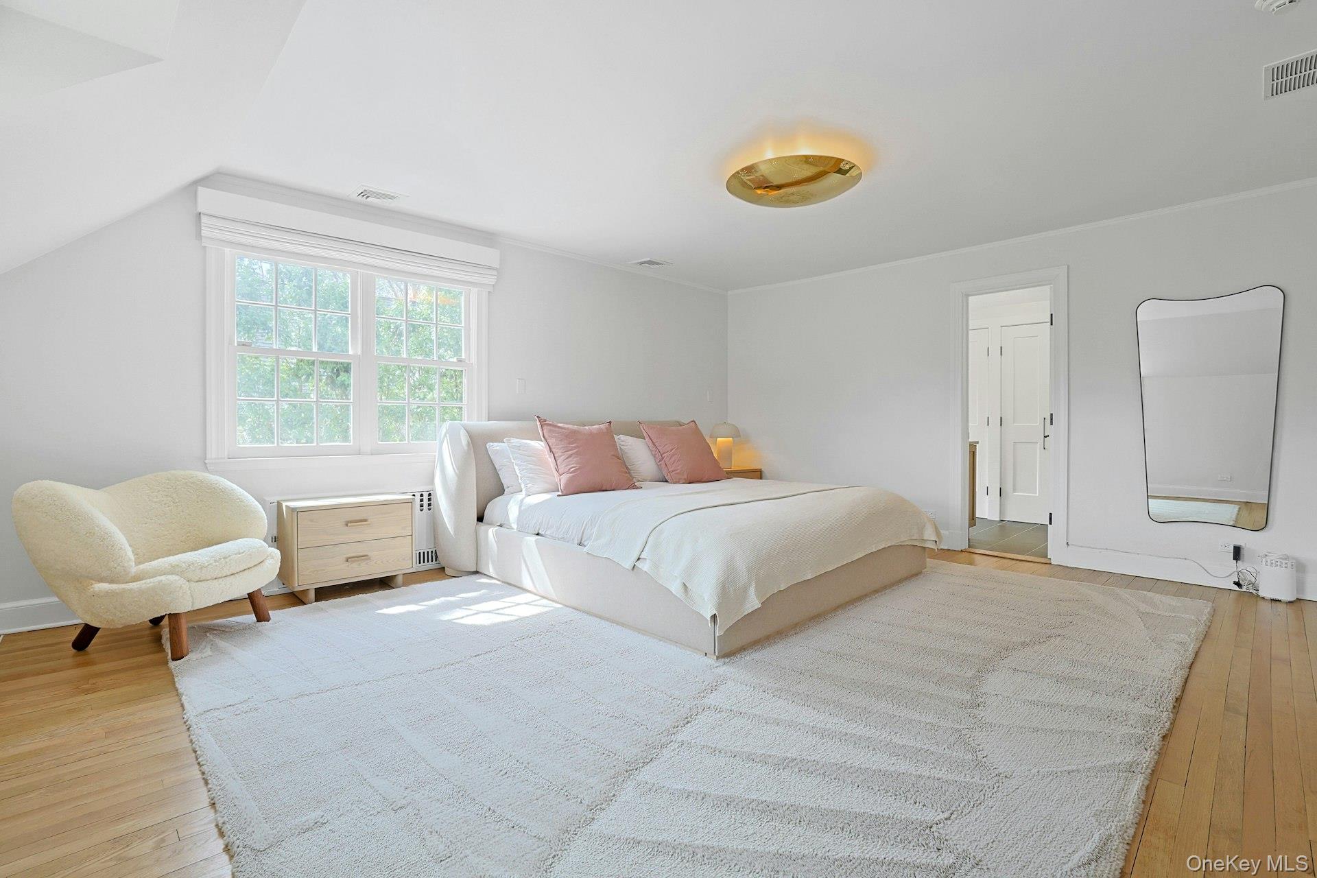 21 Tisdale Road Scarsdale, NY 10583 - Photo 18 of 40 Another view of the lovely primary bedroom with ensuite full bath and ample closet space.
