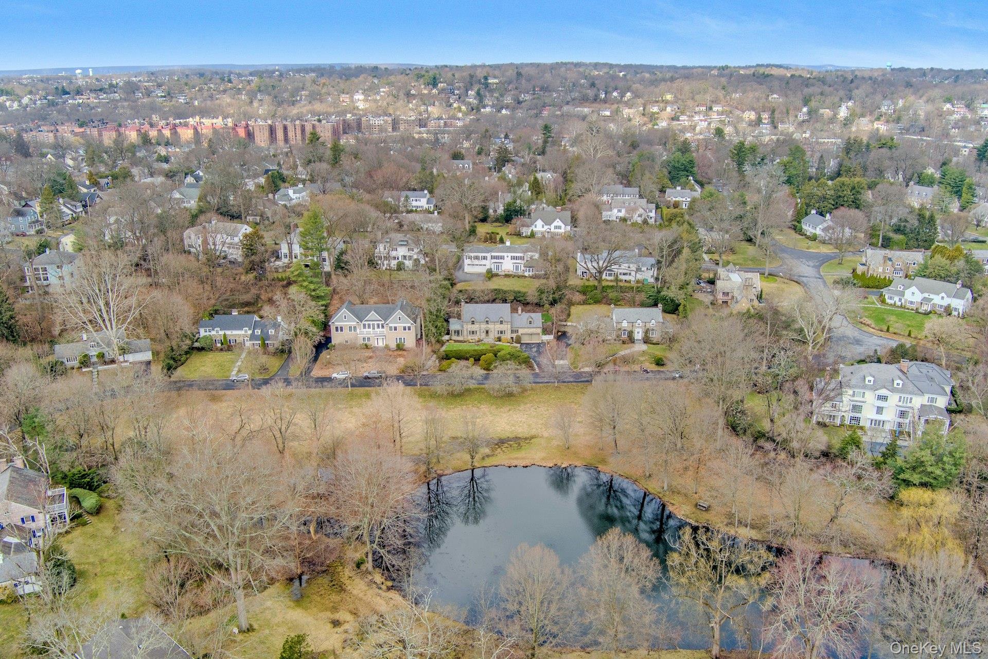 21 Tisdale Road Scarsdale, NY 10583 - Photo 2 of 40 Enjoy unobstructed views of Crane Berkley pond from 21 Tisdale. A close-knit neighborhood with buried power lines and a private homeowners association offers a true sense of community and year-round activities.
