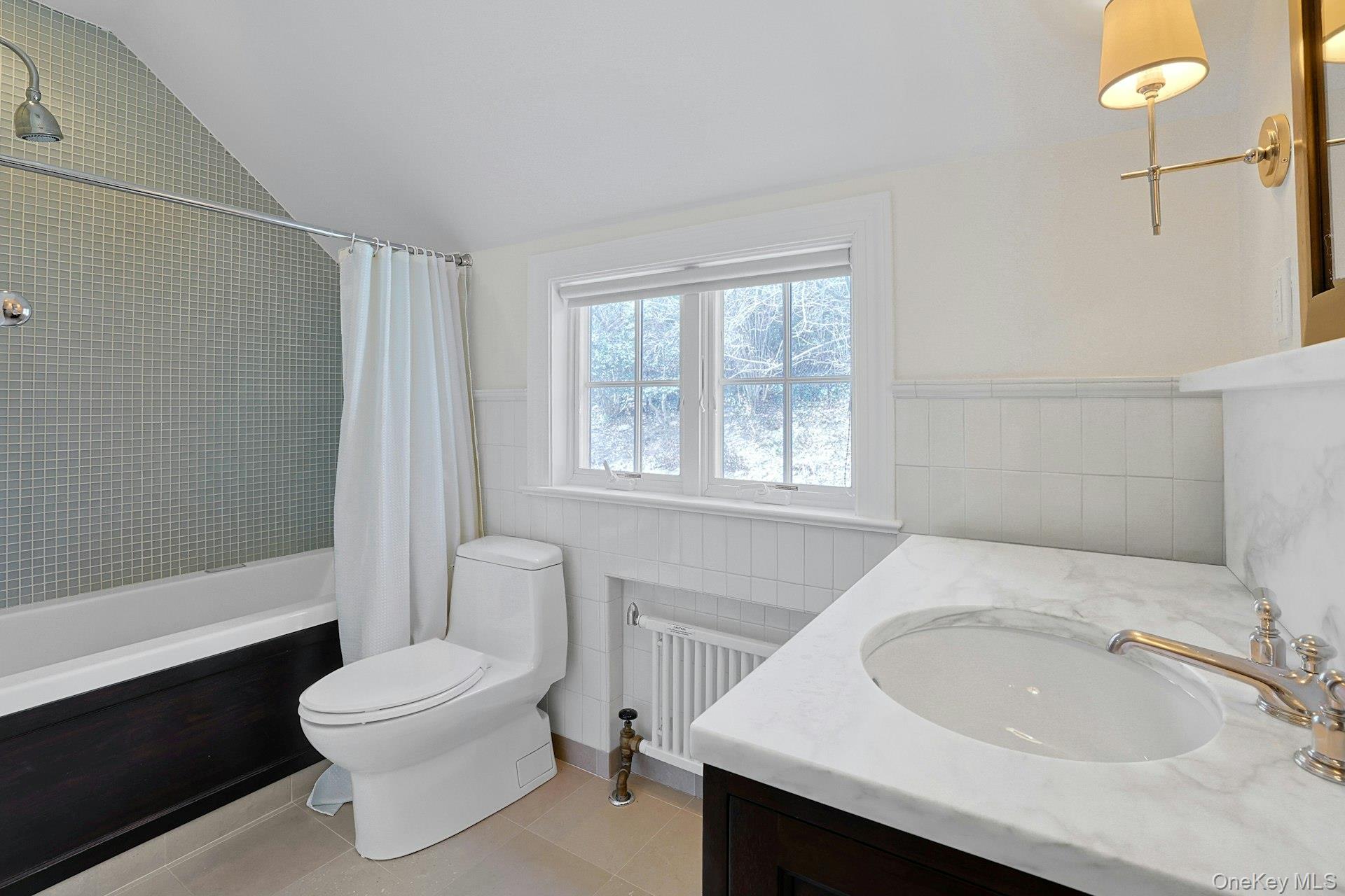 21 Tisdale Road Scarsdale, NY 10583 - Photo 23 of 40 Hall bath with shower/tub shared by two bedrooms.