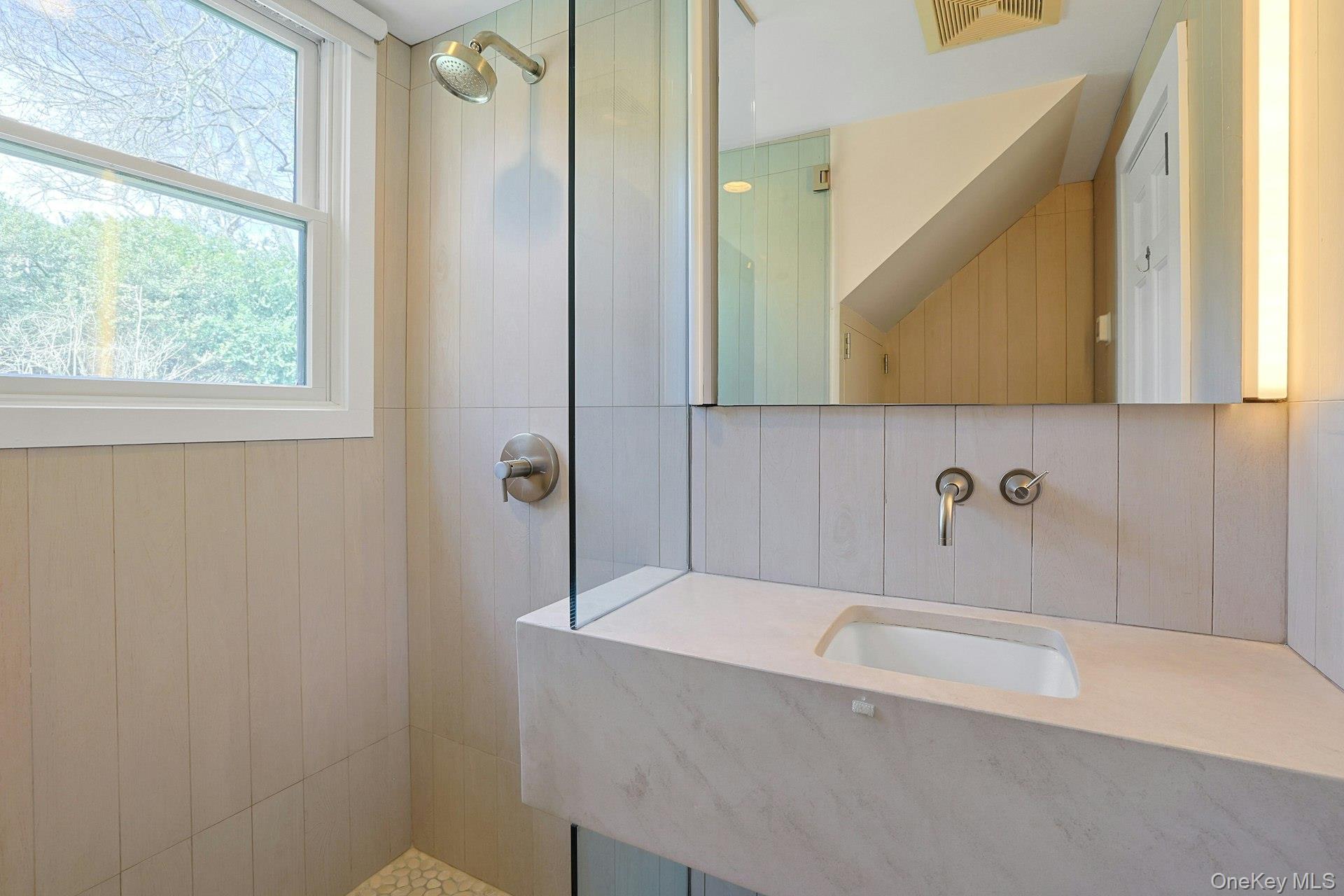 21 Tisdale Road Scarsdale, NY 10583 - Photo 26 of 40 Modern hall bath serving fourth and/or third bedroom with large shower.
