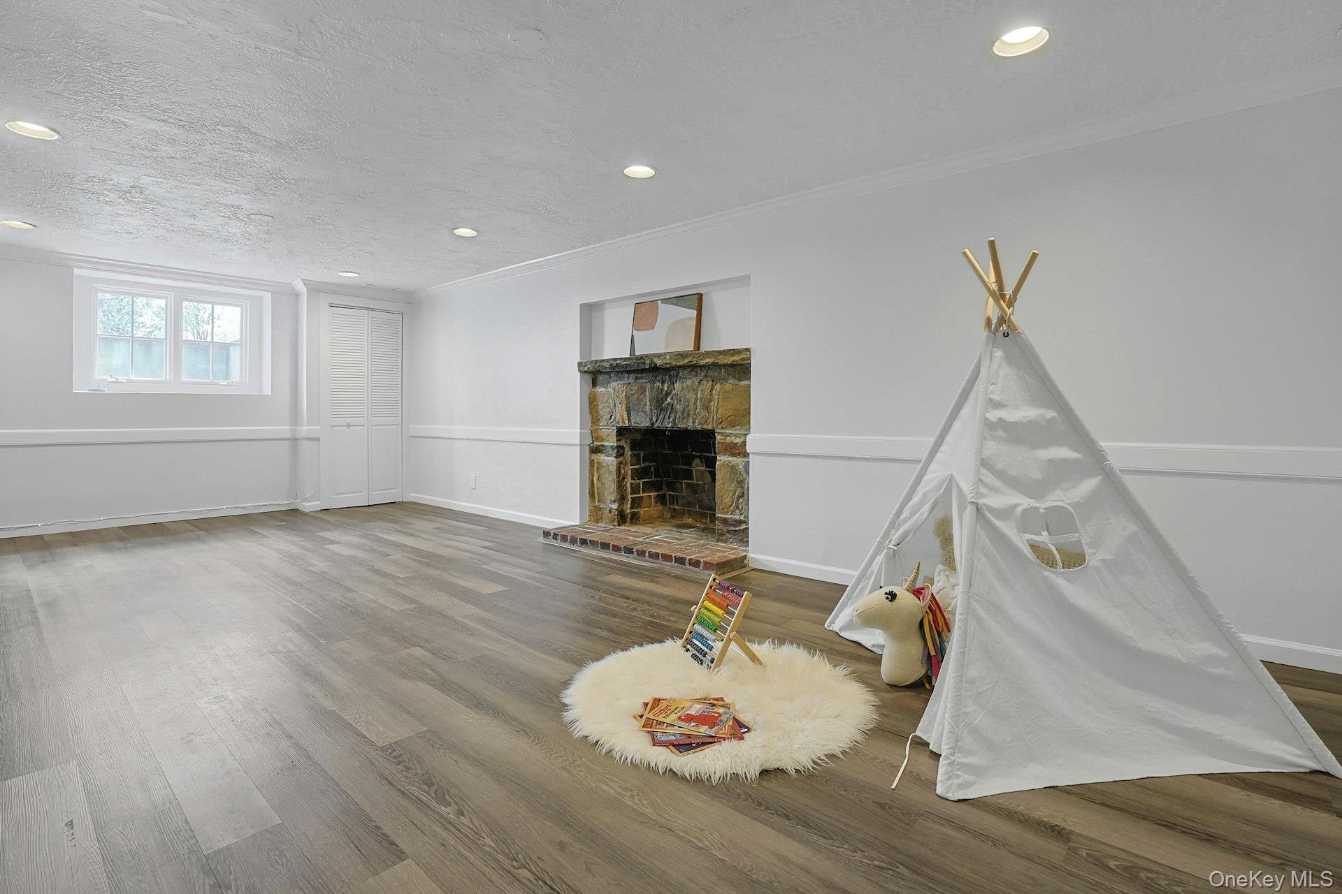 21 Tisdale Road Scarsdale, NY 10583 - Photo 28 of 40 This recreation room provides versatile space for activities of all kinds.
