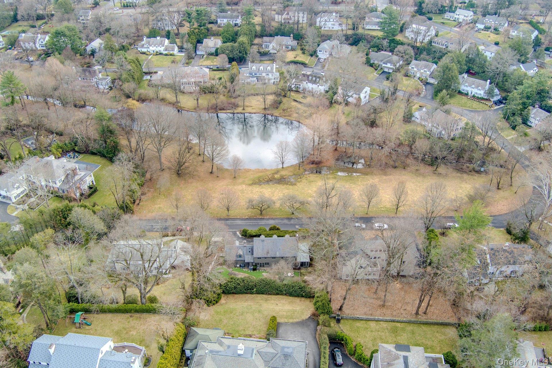 21 Tisdale Road Scarsdale, NY 10583 - Photo 37 of 40 A view of this special neighborhood designed around this central park with buried power lines to better enjoy the natural beauty of your surroundings.