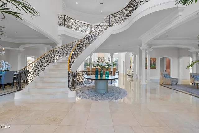 a view of a balcony with wooden fence and floor