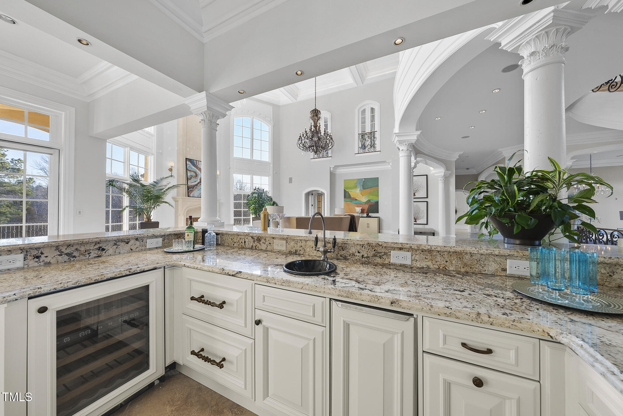 1404 Barony Lake Way Raleigh, NC 27614 - Photo 13 of 52 a kitchen with granite countertop a sink stainless steel appliances and cabinets