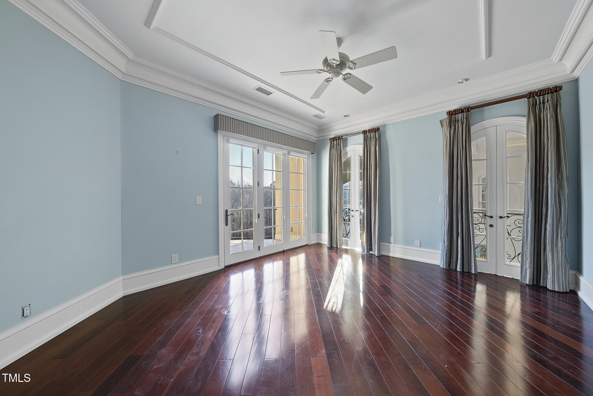 1404 Barony Lake Way Raleigh, NC 27614 - Photo 29 of 52 a view of an empty room with wooden floor and a window