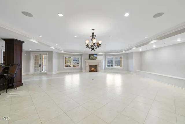 a view of hall way with furniture