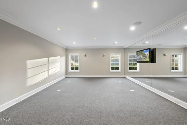 a large room with gym equipment