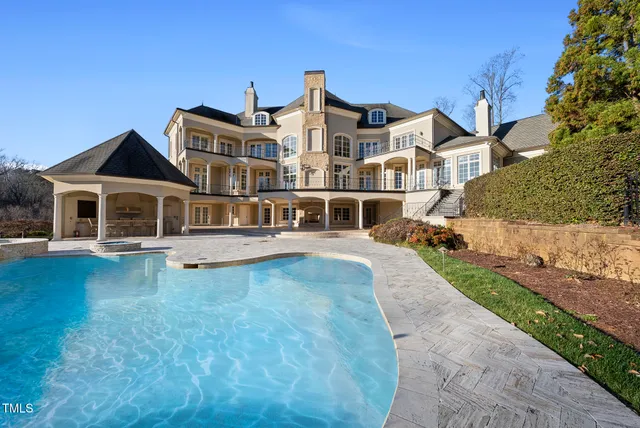 a picture of a bench in front of a building