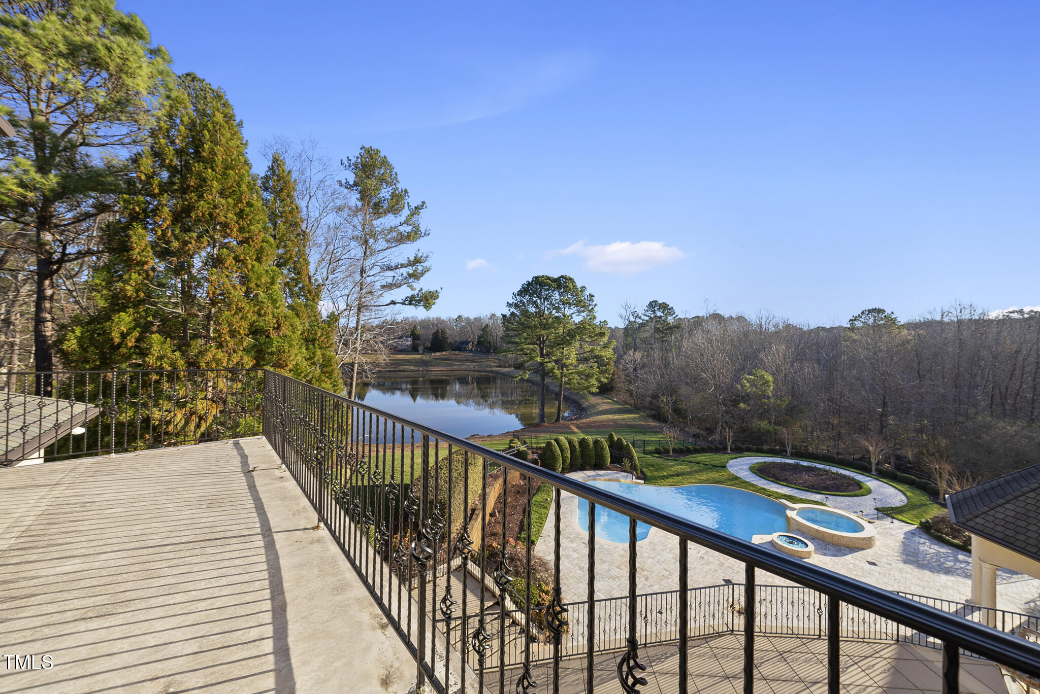 1404 Barony Lake Way Raleigh, NC 27614 - Photo 5 of 52 a view of a balcony with wooden fence and floor
