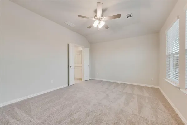 a bathroom with a double vanity sink and shower