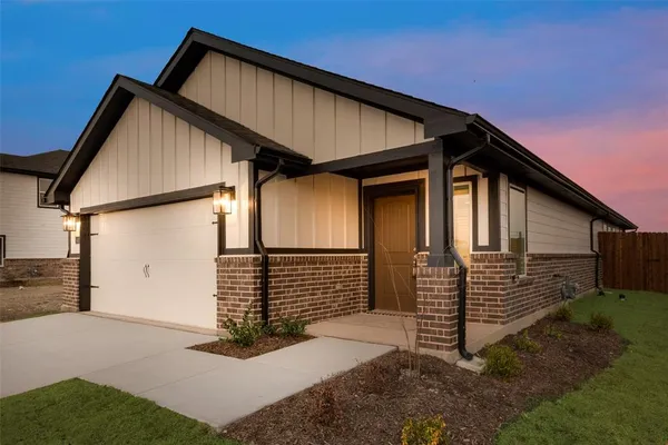 a kitchen with a sink stove and refrigerator