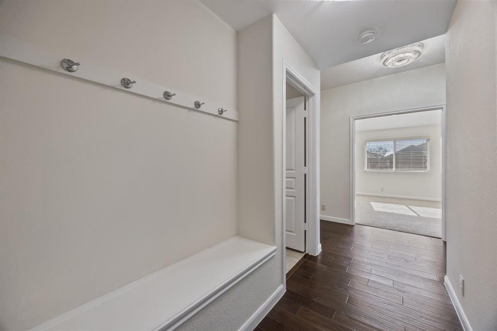 4104 Gaillardia Way Forney, TX 75126 - Photo 19 of 34 a bathroom with a bathtub and a shower