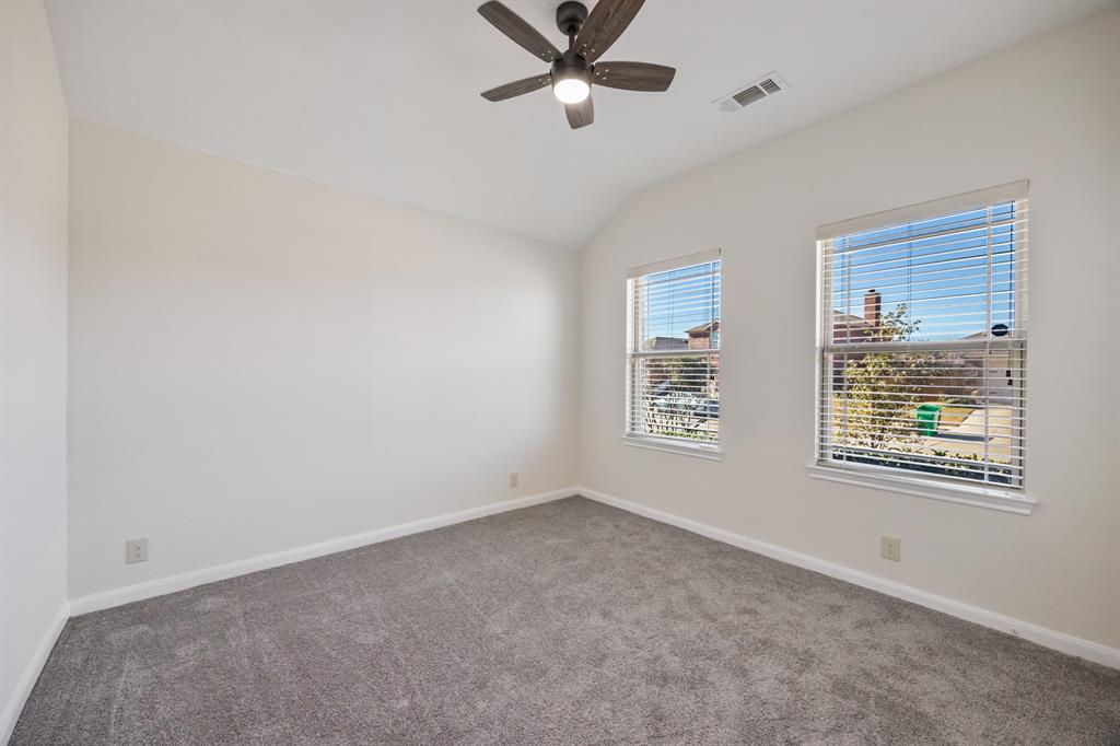 4104 Gaillardia Way Forney, TX 75126 - Photo 21 of 34 a view of an empty room with a window