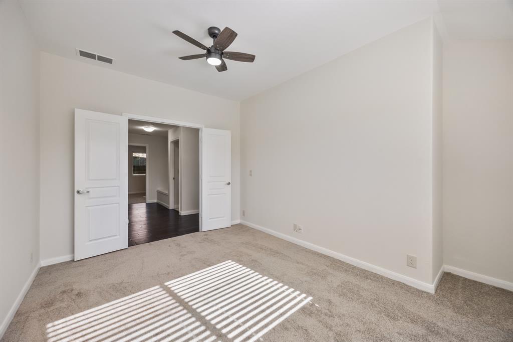 4104 Gaillardia Way Forney, TX 75126 - Photo 23 of 34 a view of a livingroom with a flat screen tv