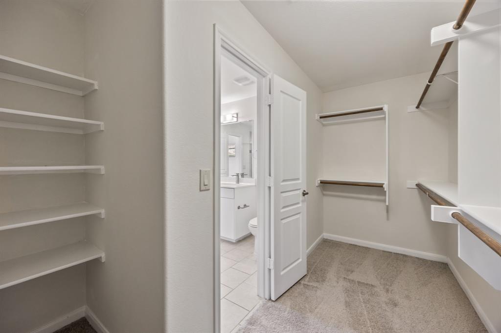 4104 Gaillardia Way Forney, TX 75126 - Photo 25 of 34 a view of walk in closet