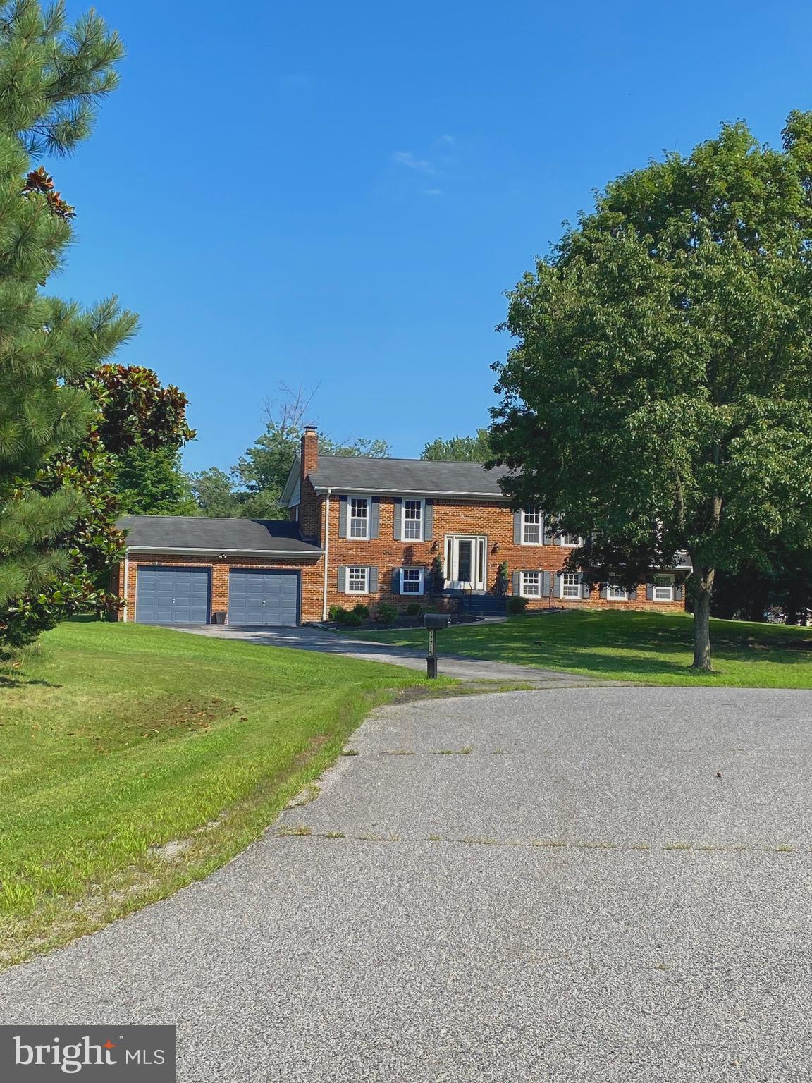 37715 Apache Road Charlotte Hall, MD 20622 - Photo 1 of 35 a view of a house with a yard and front view of a house